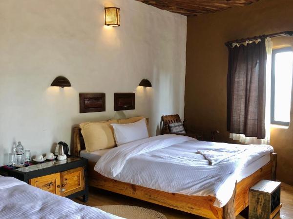 Bhanjyang Village Lodge : photo 1 de la chambre chambre double ou lits jumeaux