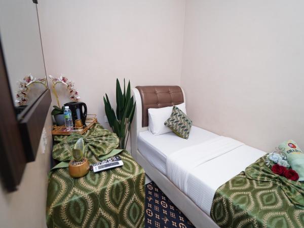 Ghazrin's Classic : photo 3 de la chambre chambre simple avec salle de bains privative