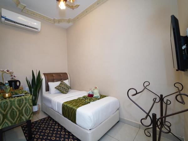 Ghazrin's Classic : photo 2 de la chambre chambre simple avec salle de bains privative