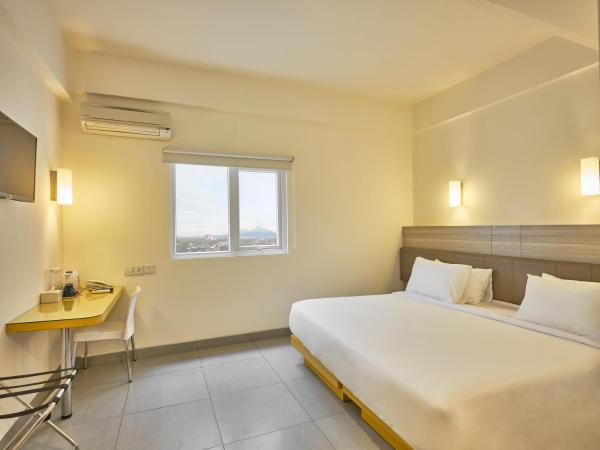 Carani Hotel Yogyakarta : photo 2 de la chambre chambre lits jumeaux smart