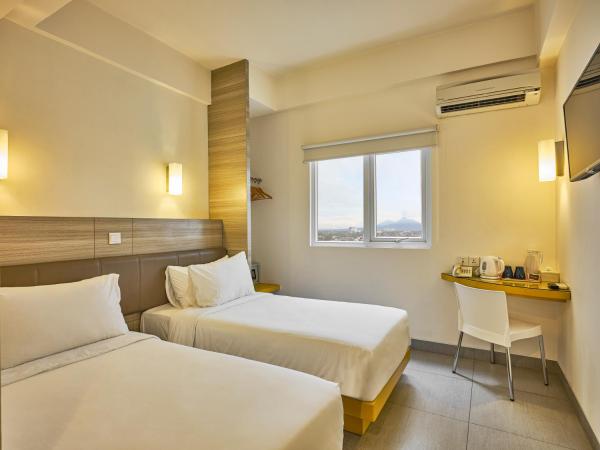 Carani Hotel Yogyakarta : photo 3 de la chambre chambre lits jumeaux smart