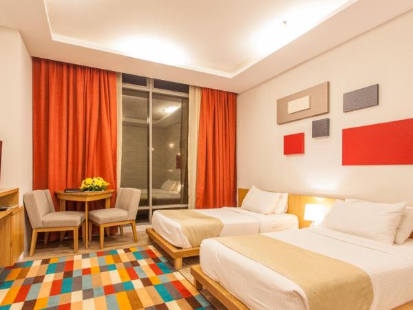 Casuarina@Meru : photo 2 de la chambre chambre lits jumeaux deluxe