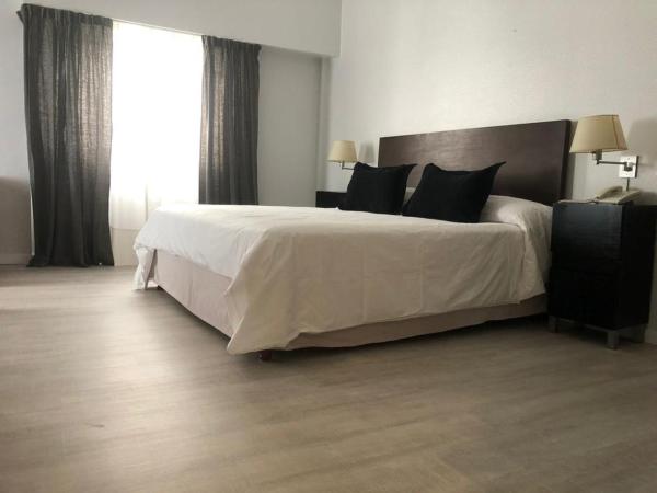 Hotel La Perla : photo 1 de la chambre chambre double