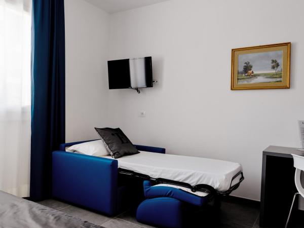 L'Essenza Hotel : photo 3 de la chambre chambre triple - accessible aux personnes à mobilité réduite