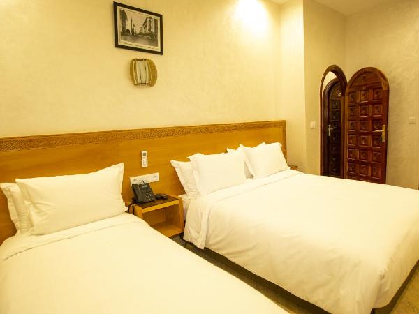 Hotel de paris : photo 9 de la chambre chambre triple