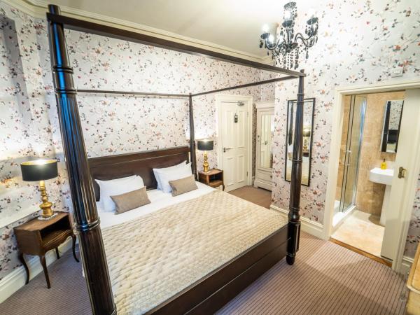Brooks Guesthouse : photo 1 de la chambre chambre double avec lit à baldaquin king-size