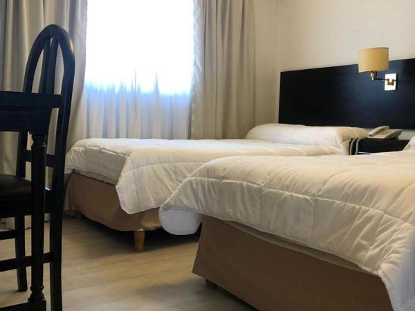 Hotel La Perla : photo 4 de la chambre chambre lits jumeaux/double
