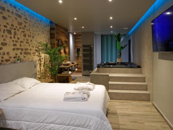 LA DOLCEVITA SPA Chambre privative : photo 1 de la chambre chambre double avec baignoire spa