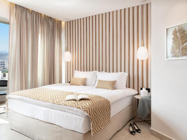 M City Hotel : photo 10 de la chambre suite familiale