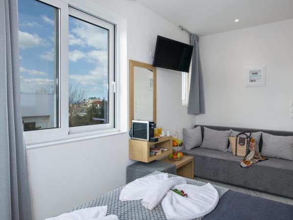 Deluxe City Hotel : photo 1 de la chambre chambre triple standard