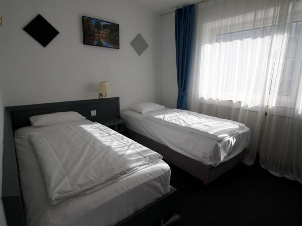 Hotel Merian : photo 1 de la chambre chambre lits jumeaux