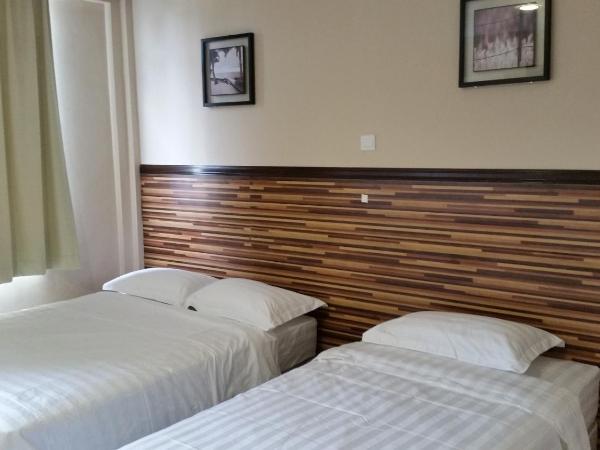 Hotel Sri Iskandar : photo 3 de la chambre chambre familiale (4 adultes)