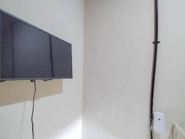 Swahouse Tanjung Priok Syariah Mitra RedDoorz : photo 3 de la chambre chambre double standard