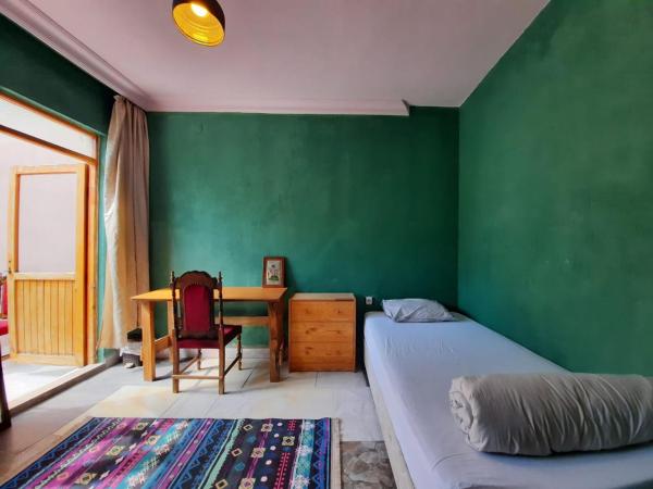 hostel vague : photo 5 de la chambre chambre lits jumeaux avec balcon