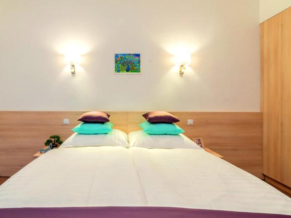 Global Suites Budapest : photo 2 de la chambre grande chambre double ou lits jumeaux