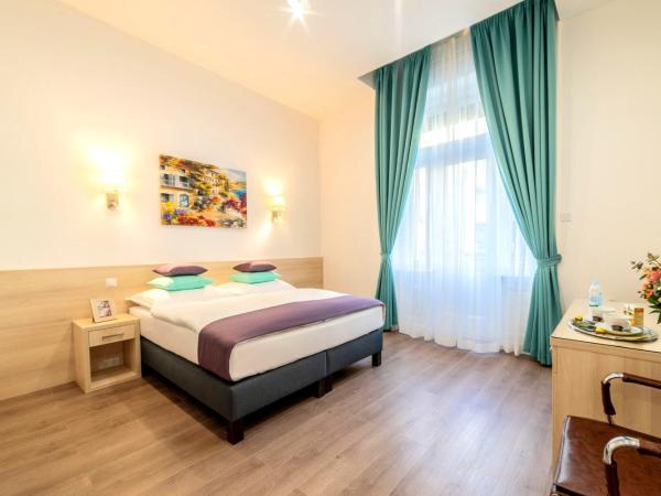 Global Suites Budapest : photo 1 de la chambre chambre double ou lits jumeaux deluxe avec balcon