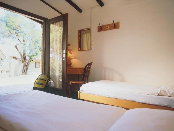 Feriendorf zum störrischen Esel : photo 2 de la chambre cottage