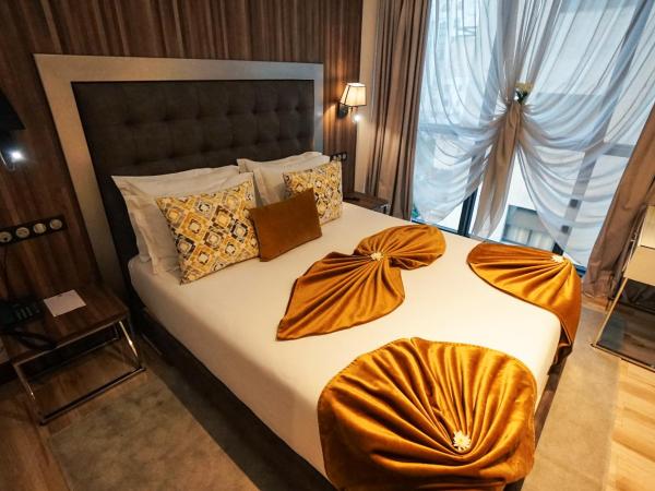 SBN Suite Hôtel : photo 3 de la chambre suite de luxe avec vue latérale sur la mer 