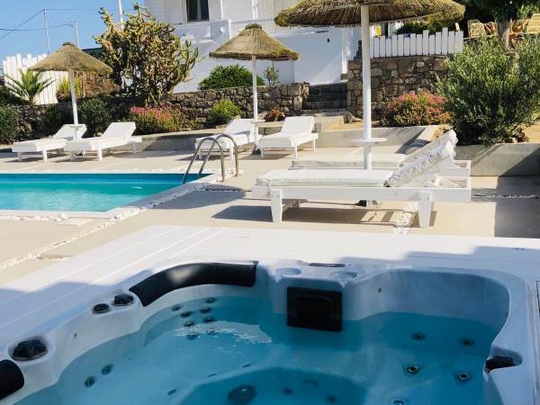 Amperian Mykonos Suites & Villas : photo 3 de la chambre villa 4 chambres avec piscine privée et bain à remous - vue sur mer