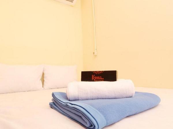 Swahouse Tanjung Priok Syariah Mitra RedDoorz : photo 9 de la chambre chambre double standard