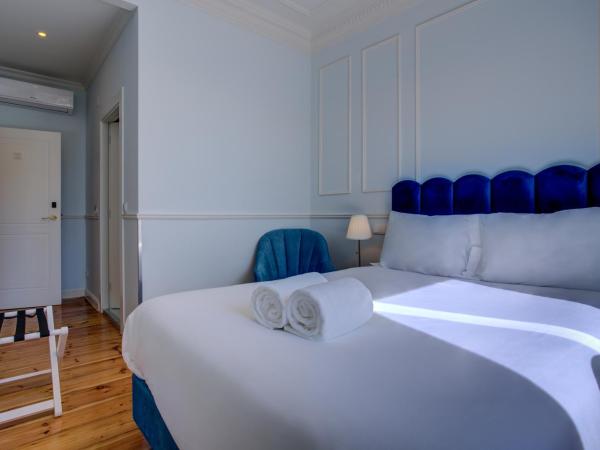 Solar dos Poetas : photo 1 de la chambre chambre double avec vue sur la place