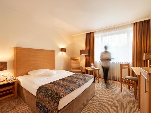 Hotel Munte am Stadtwald : photo 1 de la chambre chambre double Économique