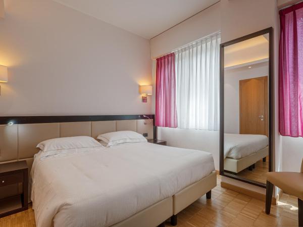Hotel Ariston : photo 1 de la chambre chambre triple