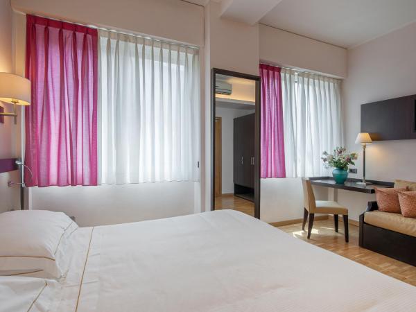 Hotel Ariston : photo 4 de la chambre chambre triple