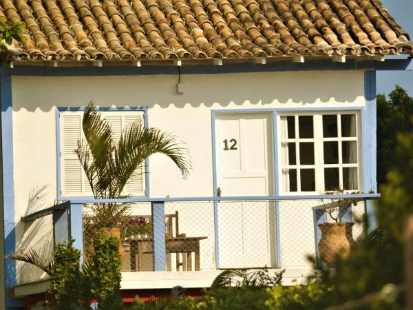 Pousada Manaaki : photo 1 de la chambre chambre triple avec balcon