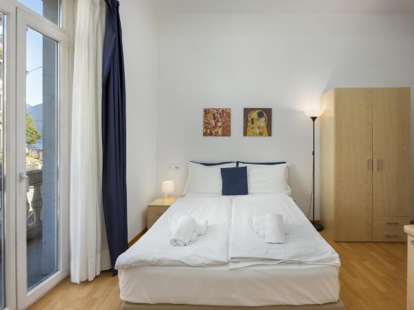 GuestHouse Lugano Center by LR : photo 1 de la chambre chambre double lit queen-size - vue sur lac