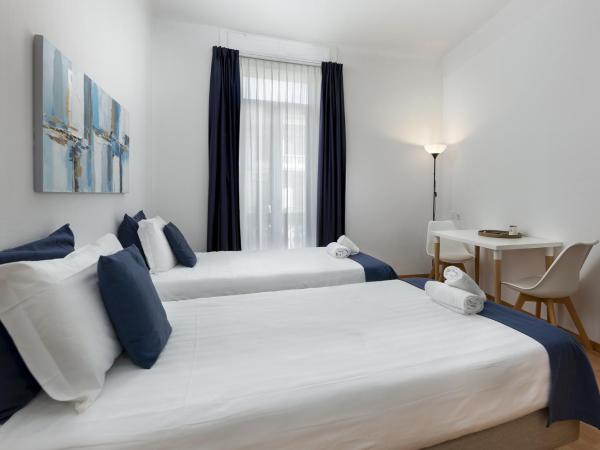 GuestHouse Lugano Center by LR : photo 2 de la chambre chambre double ou lits jumeaux - vue sur lac