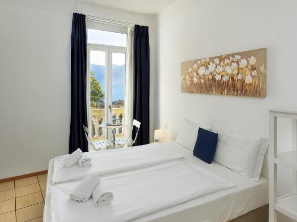 GuestHouse Lugano Center by LR : photo 1 de la chambre chambre double ou lits jumeaux - vue sur lac