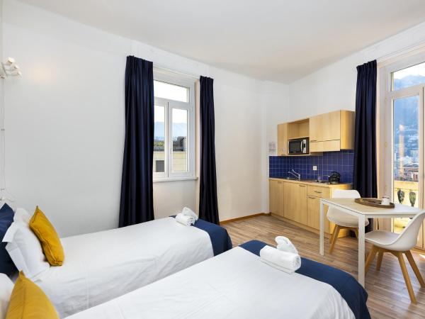 GuestHouse Lugano Center by LR : photo 6 de la chambre chambre double ou lits jumeaux