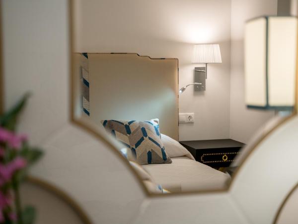 Arco Macarena Lofts : photo 9 de la chambre appartement familial supérieur