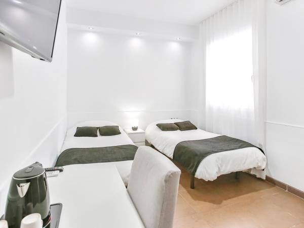 Laramond Barcelona Rooms : photo 1 de la chambre chambre lits jumeaux avec salle de bains privative