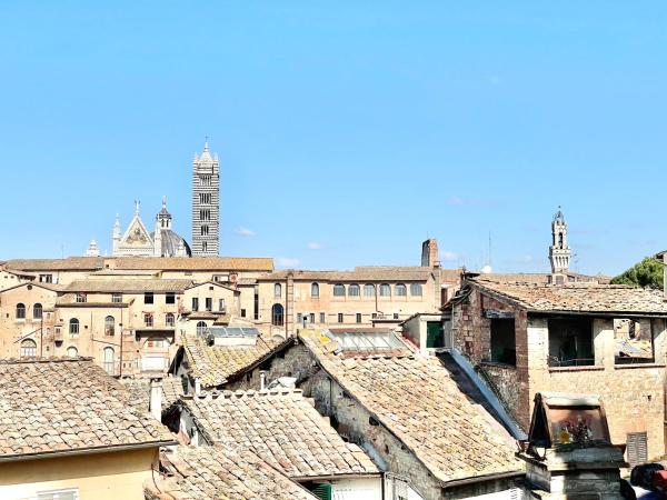 Il Barbero Apartment : photo 4 de la chambre chambre double avec salle de bains privative extérieure