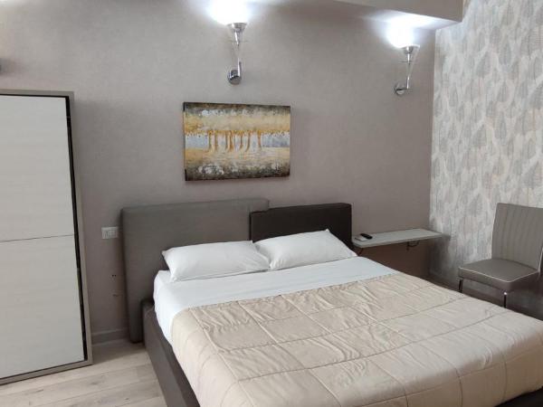 Nitto House : photo 2 de la chambre chambre quadruple avec salle de bains privative
