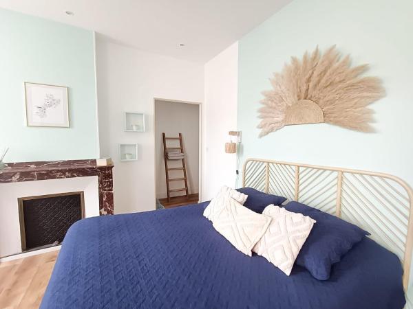 Chambres d'hotes - Le Magnolia : photo 4 de la chambre chambre lit queen-size avec balcon