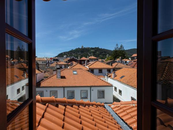 Rua Grande Hotel : photo 1 de la chambre chambre quadruple premium