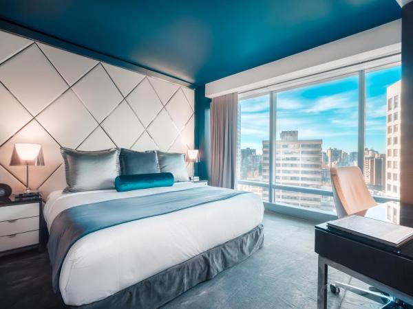 Paradox Hotel Vancouver : photo 3 de la chambre hébergement lit king-size cityscape