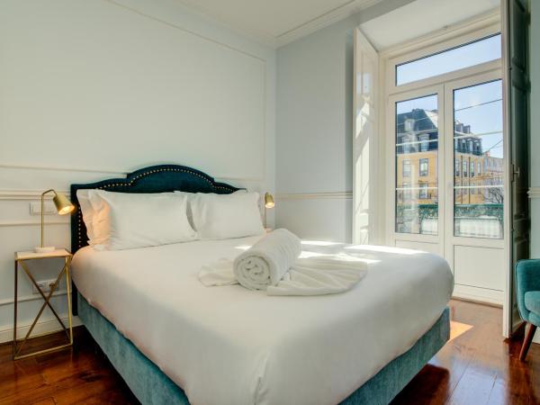 Solar dos Poetas : photo 1 de la chambre chambre double avec balcon - vue sur place