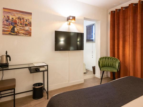 Hôtel l'Amandière : photo 4 de la chambre chambre triple 