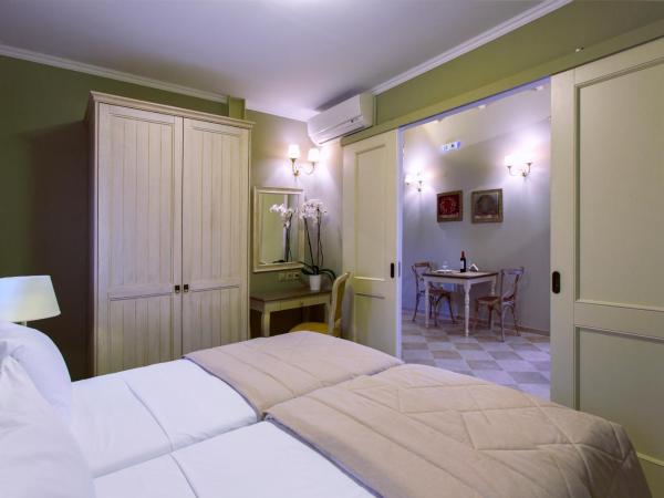 Ionia Suites : photo 1 de la chambre studio lit double ou lits jumeaux de luxe