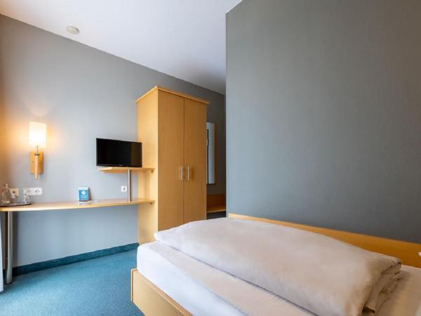 Trip Inn Hotel Conti : photo 1 de la chambre chambre simple