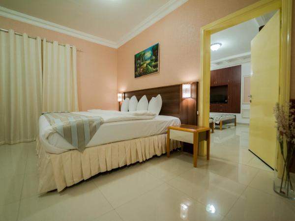 Al Ghubrah Plaza Hotel : photo 4 de la chambre chambre familiale deluxe
