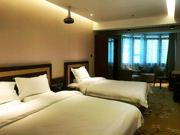 Sun Moon Lake Hotel Dalian : photo 3 de la chambre chambre familiale