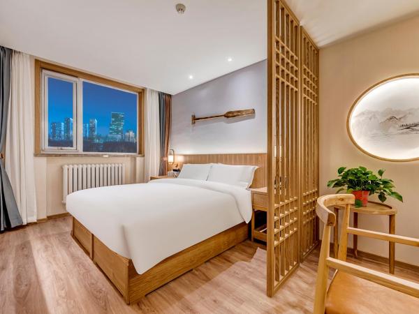 Happy Dragon Universal Vacation Hotel - close to Universal Studio and Wanda Plaza,free pick up to the studio,Free Coffee,Laundry : photo 6 de la chambre chambre lit queen-size deluxe