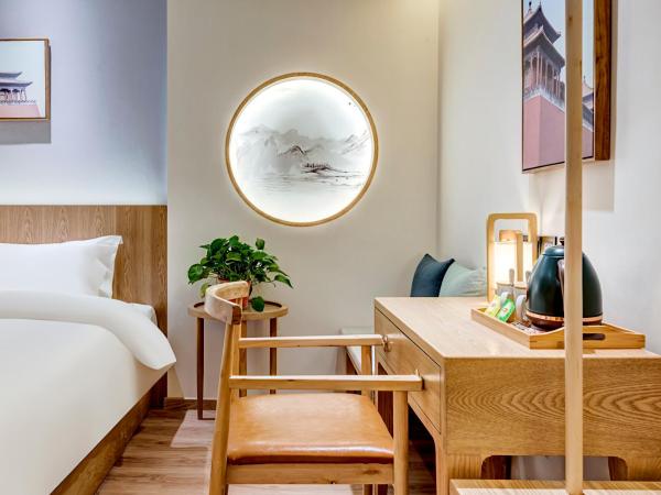 Happy Dragon Universal Vacation Hotel - close to Universal Studio and Wanda Plaza,free pick up to the studio,Free Coffee,Laundry : photo 3 de la chambre chambre lits jumeaux deluxe