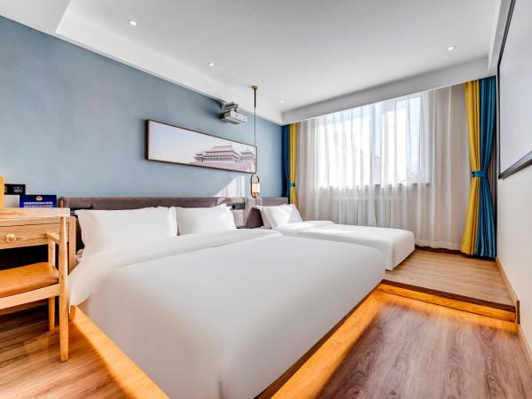 Happy Dragon Universal Vacation Hotel - close to Universal Studio and Wanda Plaza,free pick up to the studio,Free Coffee,Laundry : photo 1 de la chambre sunny family tatami room