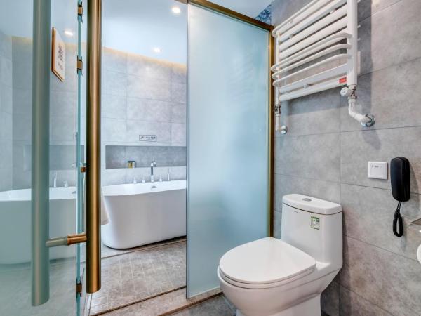 Happy Dragon Universal Vacation Hotel - close to Universal Studio and Wanda Plaza,free pick up to the studio,Free Coffee,Laundry : photo 5 de la chambre suite familiale deluxe